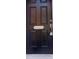 Black front door with a silver address plaque, 5409 at 5409 Crescentview Pkwy, Raleigh, NC 27606