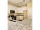 Modern kitchen featuring white cabinets and granite countertops at 5409 Crescentview Pkwy, Raleigh, NC 27606