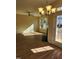 Living room with hardwood floors, fireplace, and access to deck at 5409 Crescentview Pkwy, Raleigh, NC 27606