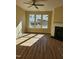 Living room with hardwood floors, fireplace, and large windows at 5409 Crescentview Pkwy, Raleigh, NC 27606