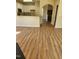 Bright living room with hardwood floors and access to kitchen at 5409 Crescentview Pkwy, Raleigh, NC 27606