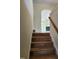 Wooden staircase leading to the second floor at 5409 Crescentview Pkwy, Raleigh, NC 27606