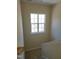 Upstairs hallway with carpet and a window at 5409 Crescentview Pkwy, Raleigh, NC 27606