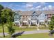 Row of townhouses viewed from above, showcasing the community layout at 705 Traditions Grande Blvd, Wake Forest, NC 27587