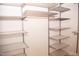 Walk-in closet featuring ample shelving and hanging space at 705 Traditions Grande Blvd, Wake Forest, NC 27587