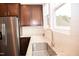 Kitchen sink and faucet with granite countertop and cabinets at 705 Traditions Grande Blvd, Wake Forest, NC 27587