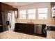 Modern kitchen with stainless steel appliances and granite countertops at 705 Traditions Grande Blvd, Wake Forest, NC 27587