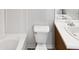 Clean bathroom with tub, toilet and double vanity at 83 Valleyfield Dr, Clayton, NC 27527