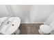 Clean bathroom with pedestal sink and toilet at 83 Valleyfield Dr, Clayton, NC 27527