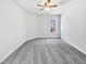 Bright bedroom with grey carpet and large window at 83 Valleyfield Dr, Clayton, NC 27527