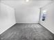 Spacious bedroom with grey carpet and window at 83 Valleyfield Dr, Clayton, NC 27527