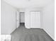 Bedroom with grey carpet and double closets at 83 Valleyfield Dr, Clayton, NC 27527