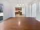 Bright dining room with hardwood floors and view of kitchen at 83 Valleyfield Dr, Clayton, NC 27527