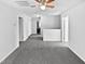 Upstairs hallway with ceiling fan and access to bedrooms at 83 Valleyfield Dr, Clayton, NC 27527
