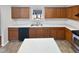 Kitchen with wood cabinets and large sink at 83 Valleyfield Dr, Clayton, NC 27527