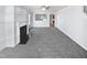 Living room with fireplace and view into kitchen at 83 Valleyfield Dr, Clayton, NC 27527