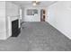Living room with fireplace and view into kitchen at 83 Valleyfield Dr, Clayton, NC 27527