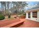 The back deck features a bench overlooking a wooded lot at 908 Glen Eden Dr, Raleigh, NC 27612