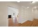 Built-in shelving and hardwood floors in library with access to Gathering room at 908 Glen Eden Dr, Raleigh, NC 27612