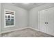 Spacious bedroom with neutral walls and carpeting at 1000 N Mckay St, Dunn, NC 28334