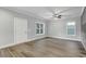 Bright and spacious living area with hardwood floors and neutral walls at 1000 N Mckay St, Dunn, NC 28334