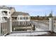 View from the balcony, showcasing the building's exterior, landscaping and surrounding neighborhood at 10310 Sablewood Dr # 108, Raleigh, NC 27617