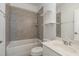 Clean bathroom, featuring a bathtub and updated vanity at 10310 Sablewood Dr # 108, Raleigh, NC 27617