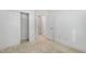 Bright bedroom features neutral carpet, white walls and closet with sliding doors at 10310 Sablewood Dr # 108, Raleigh, NC 27617