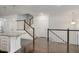 Open layout living area with stairs and beautiful wooden floors at 10310 Sablewood Dr # 108, Raleigh, NC 27617