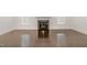 A cozy fireplace in the living room featuring wood flooring at 10310 Sablewood Dr # 108, Raleigh, NC 27617