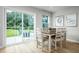 Bright dining area with sliding glass doors leading to a patio at 104 Cavalier Rider Run, Wendell, NC 27591