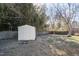 Large backyard with storage shed and wooden fence at 107 Cedar Ct, Oxford, NC 27565