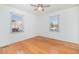 Bedroom with hardwood floors, window, and ceiling fan at 107 Cedar Ct, Oxford, NC 27565