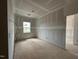 Bedroom showcasing a window view and ready for personalization at 110 Tennyson Dr, Garner, NC 27529