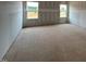 Well-lit bedroom featuring dual windows and open space at 110 Tennyson Dr, Garner, NC 27529