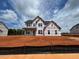 Charming two-story home featuring a classic architectural design, situated on a spacious lot at 110 Tennyson Dr, Garner, NC 27529