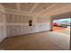 Spacious garage under construction with view to the exterior at 110 Tennyson Dr, Garner, NC 27529