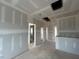 Spacious hallway featuring high ceilings and ample natural light at 110 Tennyson Dr, Garner, NC 27529