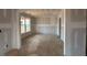 A bright, spacious living room with large windows that let in plenty of natural light at 110 Tennyson Dr, Garner, NC 27529