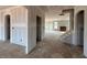 Open-concept living area with a fireplace and staircase, perfect for modern living at 110 Tennyson Dr, Garner, NC 27529