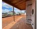 Covered patio with wood ceiling and view of the neighborhood at 110 Tennyson Dr, Garner, NC 27529