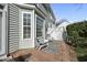 Relaxing back patio with deck and two chairs at 1112 Silky Dogwood Trl, Apex, NC 27502