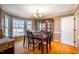 Formal dining room with hardwood floors and bay window at 1302 Apache Ln, Apex, NC 27502