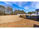 Large backyard with grassy area and stone border at 139 Red Angus Dr, Smithfield, NC 27577