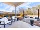 Relaxing backyard patio with fire pit and seating area at 139 Red Angus Dr, Smithfield, NC 27577