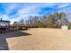 Large backyard with grassy area and shed at 139 Red Angus Dr, Smithfield, NC 27577
