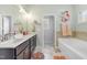 Bathroom with double sinks, garden tub and separate shower at 139 Red Angus Dr, Smithfield, NC 27577
