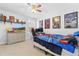 Spacious bedroom with a bed, dresser, and gaming setup at 139 Red Angus Dr, Smithfield, NC 27577