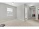 Spacious bedroom with large window and view to another bedroom at 139 Red Angus Dr, Smithfield, NC 27577