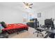 Bright bedroom with a bed, desk, and gaming setup at 139 Red Angus Dr, Smithfield, NC 27577